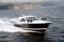 Cruising the waterways of Whangaroa in search of marlin