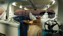 The 51 Enclosed Flybridge with IPS features an all new flybridge design with wrap-around helm