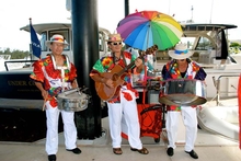The authentic Caribbean steel drum band entertained Riviera owners as they enjoyed Cocktails on the Dock