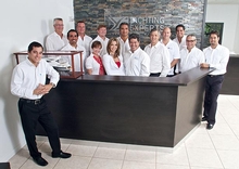 Dealer Principal Frank De Varona and his wife Betty with the team from Yachting Experts International Brokers Florida