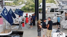 Boat buyers enjoy time to view and talk with R Marine staff at the Summer Showcase.