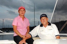 Denise and Peter Haig on their Riviera 51
