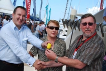 R Marine Ådelaide Dealer Andrew Craddock (left) hands the keys to the new Riviera 70 to Vicki and Bryan Stokes.
