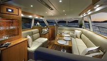 The open saloon connects to the cockpit via glass sliding door and opening rear window to create one single level entertaining space