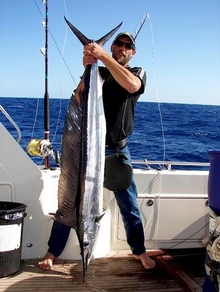 Chris with a spearfish estimate 35 kilograms