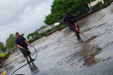 Riviera staff clean up the mess in the aftermath of the torrential rain