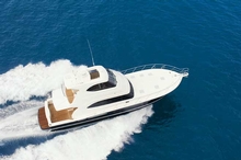 The enclosed flybridge includes an aft deck with three-seat lounge