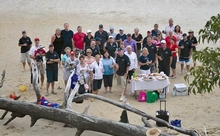 A toast to good weather and smooth cruising as the Riv team enjoys lunch on the beach