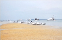 Riviera owners park their tenders on the beach at Kingfisher Bay Fraser Island