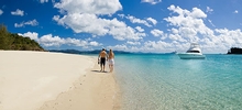 The 38 Open Flybridge anchored just off this pristine, white sandy beach