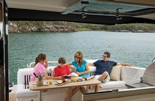 The cockpit's opulent features include a generous lounge and table for entertaining