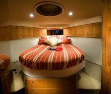 The master stateroom with island bed and ample storage is perfect for long voyages 