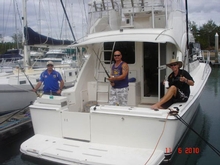 Jeff, Rob and Rick check the tackle at Cairns the day before leaving