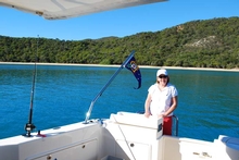 Vicki Bence enjoying a nice sunny day on board 'Mid Life Crisis'