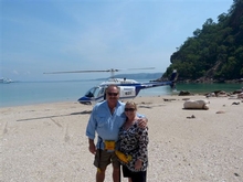 Barry and Libby Cox celebrate their 30th wedding anniversary with an ice cold bottle of Moet at Hunter Falls where they enjoyed a toast after a helicopter flight over the flights