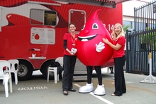 Billy the Blood Drop with representatives from the Red Cross Blood Service