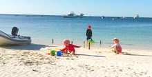 Jess, Josh and Charlotte explore the beach
