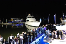 Riviera 70 Enclosed Flybridge makes a grand entrance at the 2011 Sanctuary Cove International Boat Show