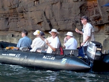 Riviera Owners enjoying Champage & Ham & Cheese Croissants while exploring King George falls (Alan lock 58SY owner with other owners)
