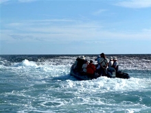 Riviera Owners waiting to see Montgomery Reef appear as the tide drops