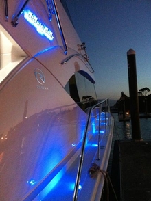 A range of lights and backlit name plate sets a boat apart at night