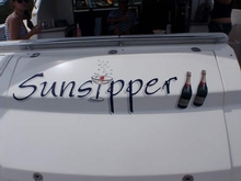 Alan and Judy Davis named their 4400 Sport Yacht Sunsipper because they enjoy celebrating on board