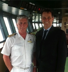 Captain Barry Cuneo (right) with the Master of the Queen Mary 2, Captain Kevin Oprey