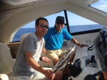 The proud new owner takes the helm